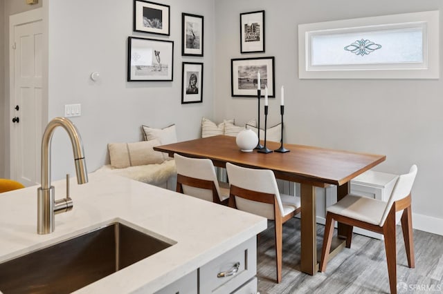 4145 Emerald St, Oakland, CA 94609 - dining room featuring light wood-type flooring and baseboards
