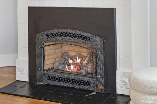 4145 Emerald St, Oakland, CA 94609 - detailed view of a tiled fireplace and wood finished floors