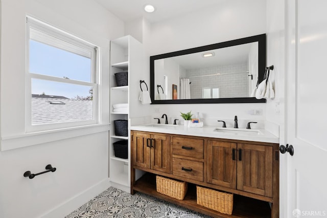 4145 Emerald St, Oakland, CA 94609 - bathroom featuring double vanity, tile patterned flooring, and a shower with curtain