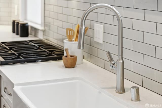 4145 Emerald St, Oakland, CA 94609 - kitchen view of backsplash, light countertops, and gas stovetop