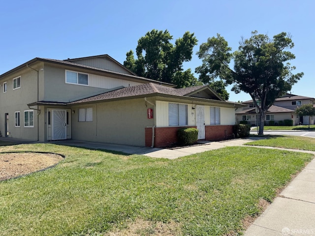 1200 Lemontree Way Unit 1, Antioch, CA 94509 - view of front facade with a front yard and brick siding