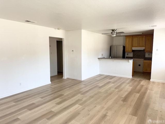 1200 Lemontree Way Unit 1, Antioch, CA 94509 - unfurnished living room with a ceiling fan and light wood-style floors