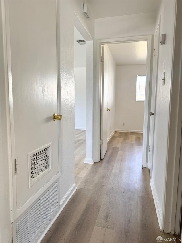 1200 Lemontree Way Unit 1, Antioch, CA 94509 - hallway with wood finished floors and baseboards