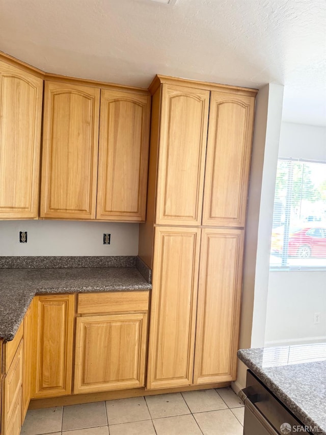 1200 Lemontree Way Unit 1, Antioch, CA 94509 - kitchen featuring light brown cabinets, light tile patterned flooring, and dark stone counters
