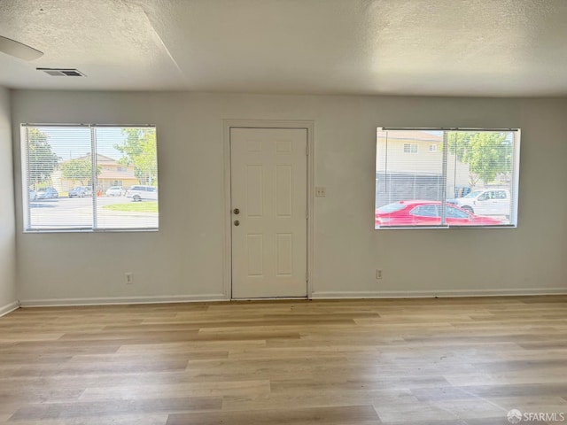 1200 Lemontree Way Unit 1, Antioch, CA 94509 - entrance foyer with light wood-style floors and a textured ceiling