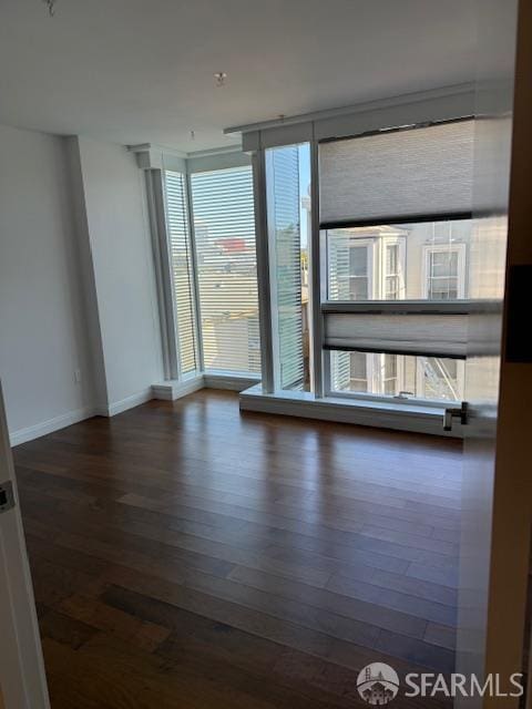 555 Fulton St Unit 322, San Francisco, CA 94102 - unfurnished room with wood finished floors and baseboards