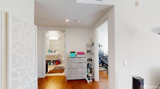555 Fulton St Unit 322, San Francisco, CA 94102 - hallway featuring wood finished floors and attic access