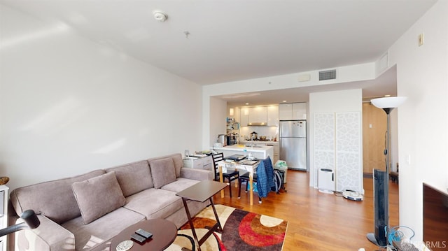555 Fulton St Unit 322, San Francisco, CA 94102 - living room featuring light wood-style flooring