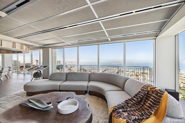 sunroom / solarium with a water view