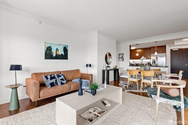 living room featuring crown molding and dark hardwood / wood-style floors