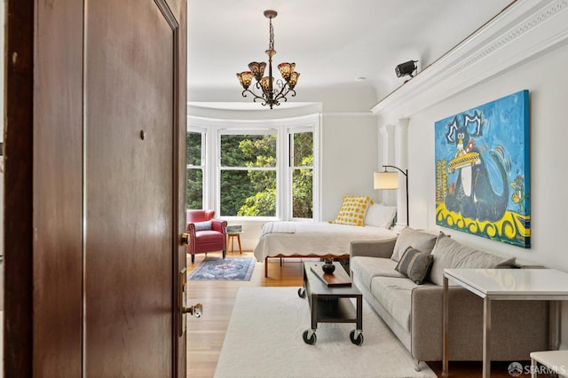 1932 Fell St Unit 1, San Francisco, CA 94117 - bedroom featuring a chandelier and light wood-style flooring