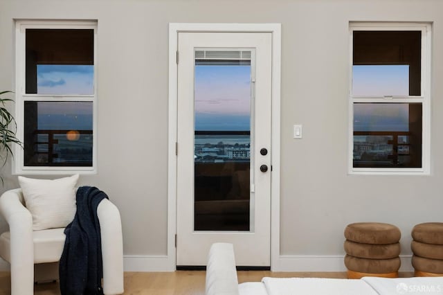 doorway with light hardwood / wood-style floors