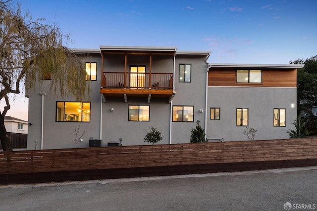 exterior space featuring central AC and a balcony