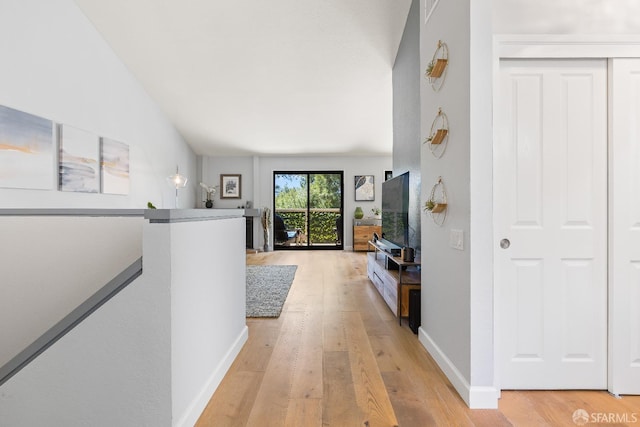 1541 Moraga Way, Moraga, CA 94556 - hallway featuring light wood-style flooring, an upstairs landing, and baseboards
