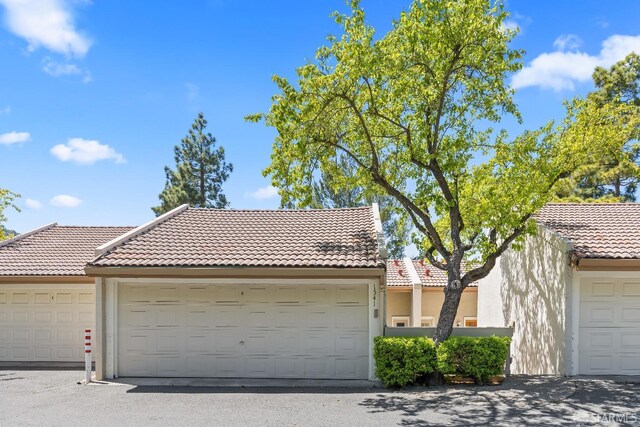 1541 Moraga Way, Moraga, CA 94556 - view of front of property with a tiled roof and stucco siding