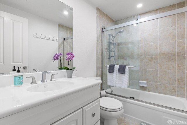 1541 Moraga Way, Moraga, CA 94556 - full bath with enclosed tub / shower combo, toilet, vanity, and recessed lighting