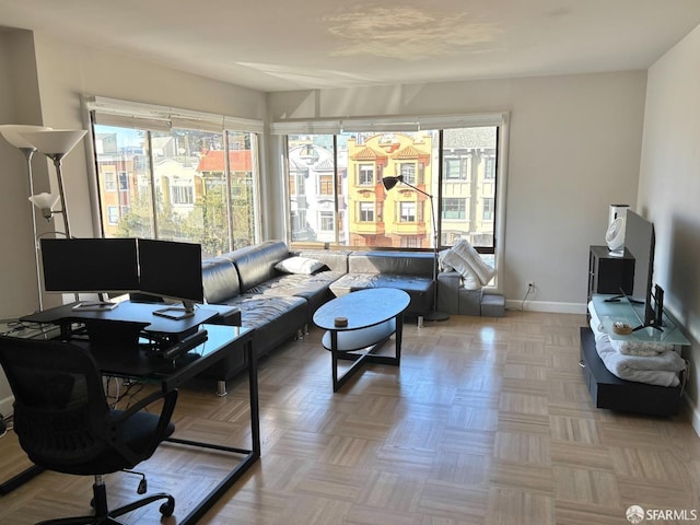 office area featuring baseboards