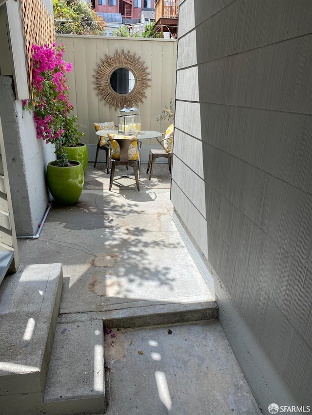 view of patio featuring outdoor dining space