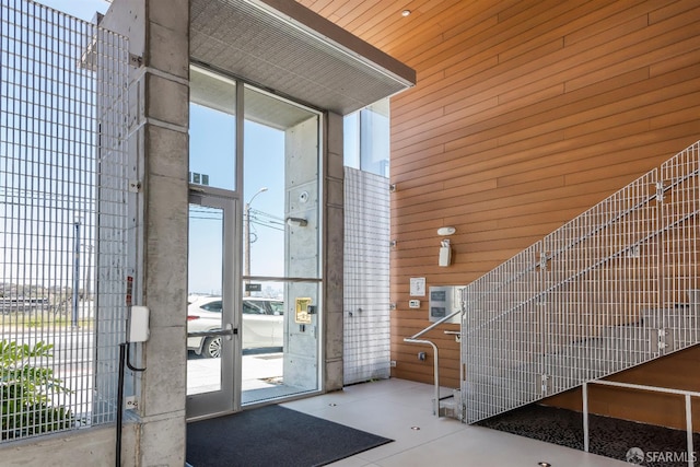 451 Donahue St Unit 207, San Francisco, CA 94124 - building lobby featuring a high ceiling and wooden walls