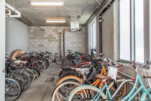 451 Donahue St Unit 207, San Francisco, CA 94124 - garage featuring concrete block wall and bike storage