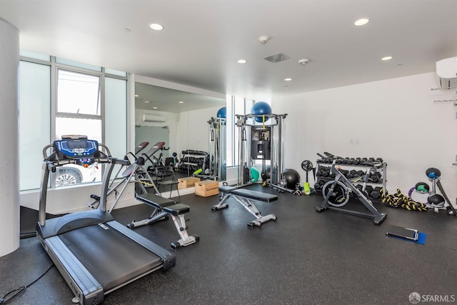 451 Donahue St Unit 207, San Francisco, CA 94124 - exercise room featuring recessed lighting and a wall unit AC