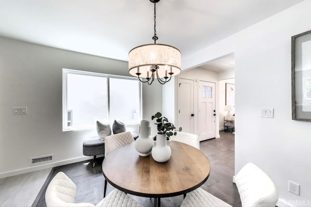 69 Fairway Dr, Daly City, CA 94015 - dining room featuring a chandelier and baseboards