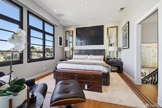 bedroom with light hardwood / wood-style floors