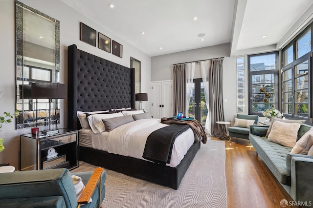 bedroom featuring hardwood / wood-style floors