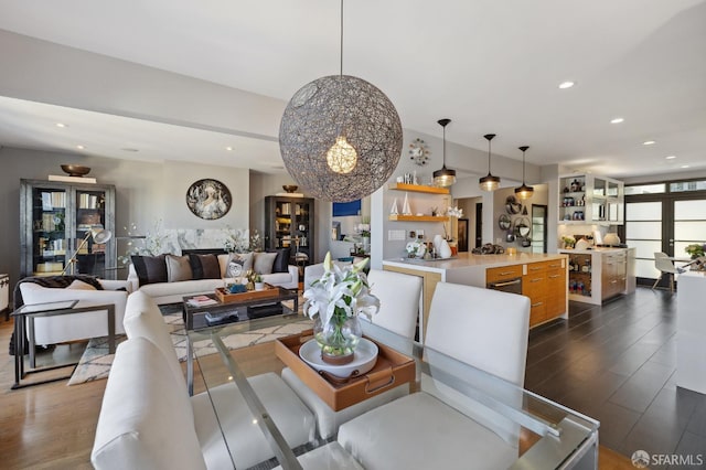 dining area featuring dark wood-type flooring