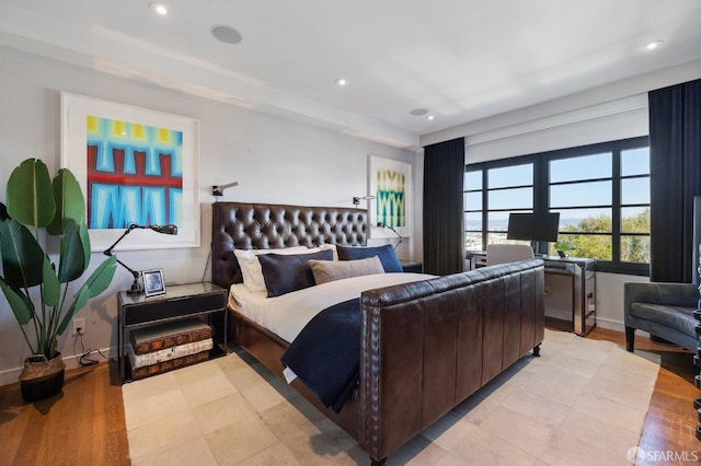 bedroom with light wood-type flooring