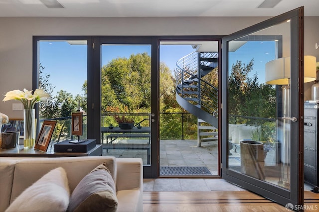 entryway with light hardwood / wood-style flooring and a wealth of natural light