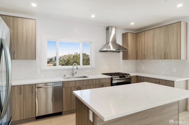 269 E Ave, San Bruno, CA 94066 - kitchen with appliances with stainless steel finishes, wall chimney exhaust hood, modern cabinets, tasteful backsplash, and recessed lighting