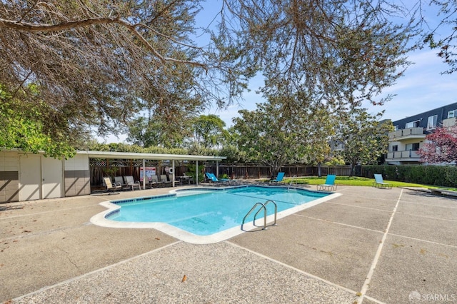 view of pool featuring a patio