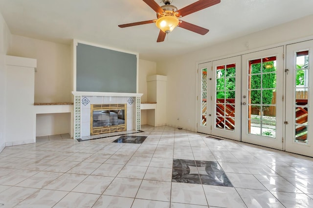 1001 Suffolk Way, Fairfield, CA 94533 - unfurnished living room featuring healthy amount of natural light, french doors, a tile fireplace, and a ceiling fan