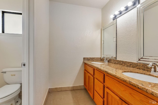 1001 Suffolk Way, Fairfield, CA 94533 - bathroom with double vanity, tile patterned flooring, and a textured wall