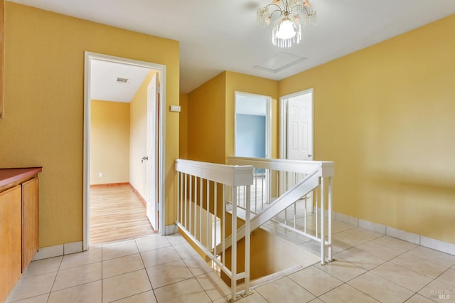 1001 Suffolk Way, Fairfield, CA 94533 - hall featuring an upstairs landing, light tile patterned flooring, and a chandelier