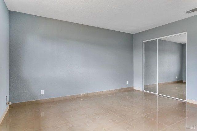 1001 Suffolk Way, Fairfield, CA 94533 - unfurnished bedroom featuring a closet and tile patterned flooring