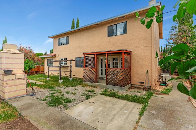 1001 Suffolk Way, Fairfield, CA 94533 - back of property with stucco siding, crawl space, and a patio