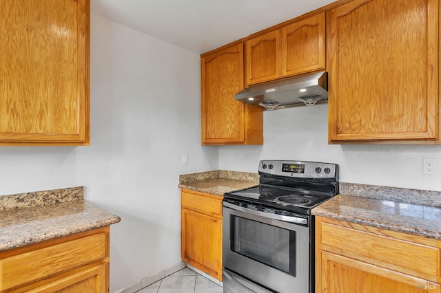 1001 Suffolk Way, Fairfield, CA 94533 - kitchen with extractor fan, stainless steel range with electric stovetop, light marble finish floors, and light stone counters