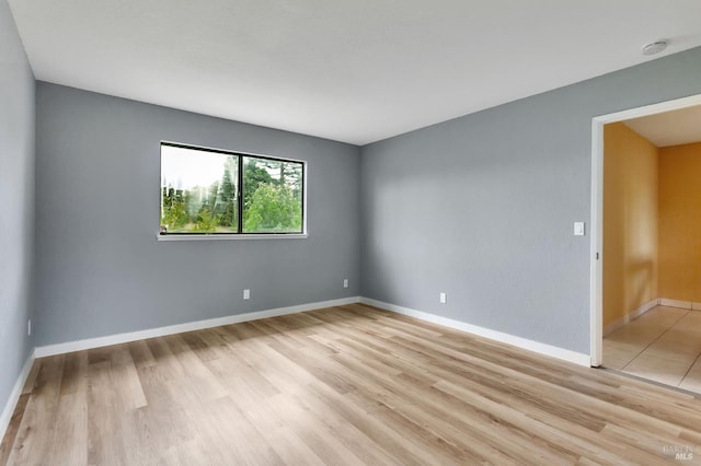 1001 Suffolk Way, Fairfield, CA 94533 - unfurnished room featuring light wood-type flooring and a smoke detector