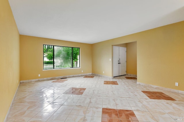 1001 Suffolk Way, Fairfield, CA 94533 - unfurnished room featuring baseboards and light tile patterned flooring