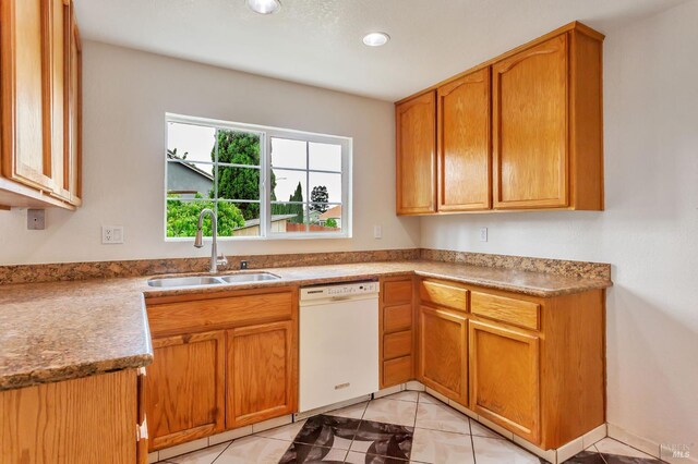 1001 Suffolk Way, Fairfield, CA 94533 - kitchen featuring white dishwasher, recessed lighting, brown cabinets, light tile patterned floors, and light countertops