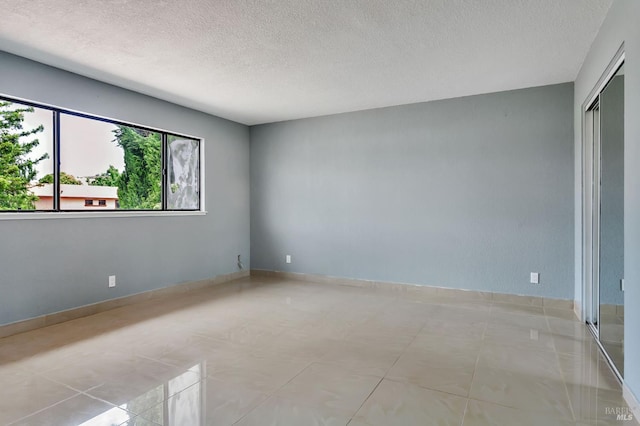 1001 Suffolk Way, Fairfield, CA 94533 - unfurnished room with a textured ceiling