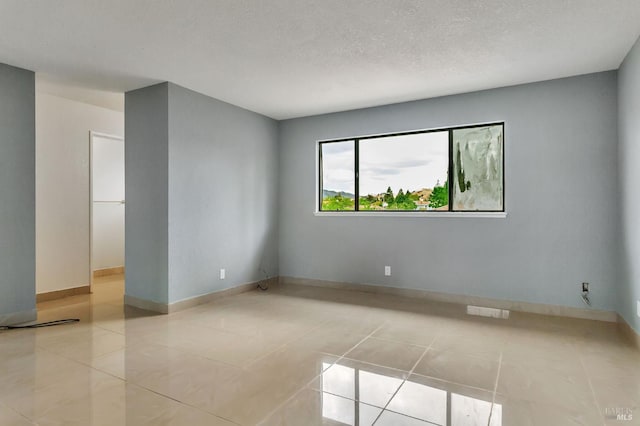 1001 Suffolk Way, Fairfield, CA 94533 - empty room featuring light tile patterned flooring and baseboards