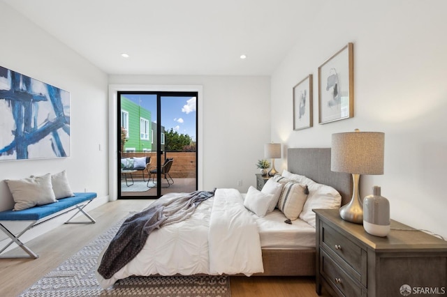 2287 45th Ave, San Francisco, CA 94116 - bedroom featuring access to outside, wood finished floors, and recessed lighting