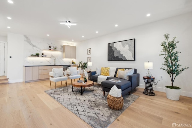 2287 45th Ave, San Francisco, CA 94116 - living area featuring light wood finished floors, recessed lighting, bar area, and baseboards
