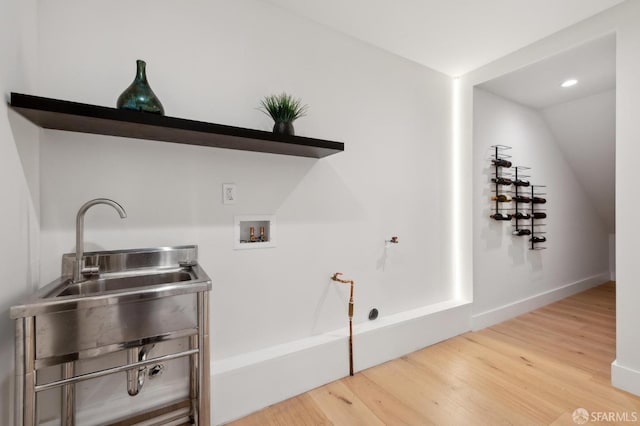 2287 45th Ave, San Francisco, CA 94116 - laundry room with hookup for a washing machine, light wood finished floors, and recessed lighting