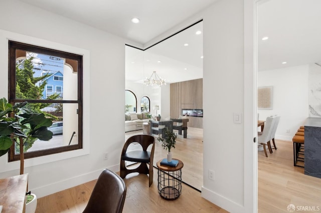 2287 45th Ave, San Francisco, CA 94116 - sitting room with a chandelier, recessed lighting, light wood-type flooring, and baseboards