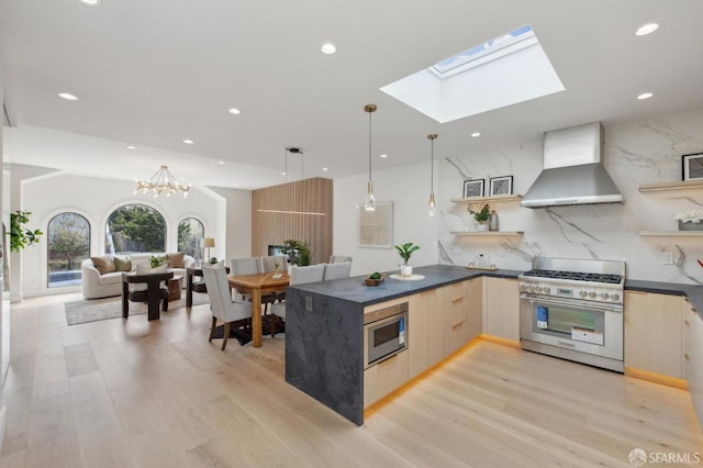 2287 45th Ave, San Francisco, CA 94116 - kitchen featuring wall chimney range hood, appliances with stainless steel finishes, open shelves, modern cabinets, and light brown cabinetry