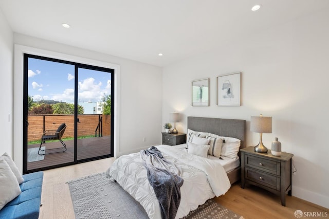 2287 45th Ave, San Francisco, CA 94116 - bedroom with access to outside, light wood finished floors, recessed lighting, and baseboards